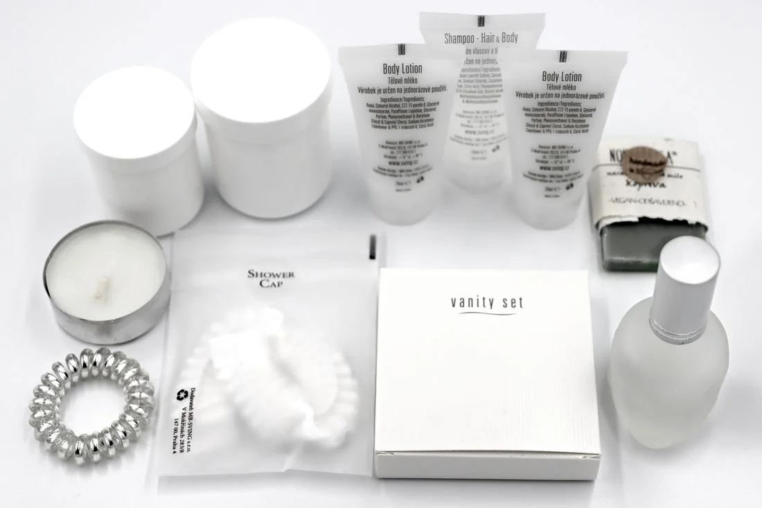 Toiletries arranged on a hotel bathroom counter